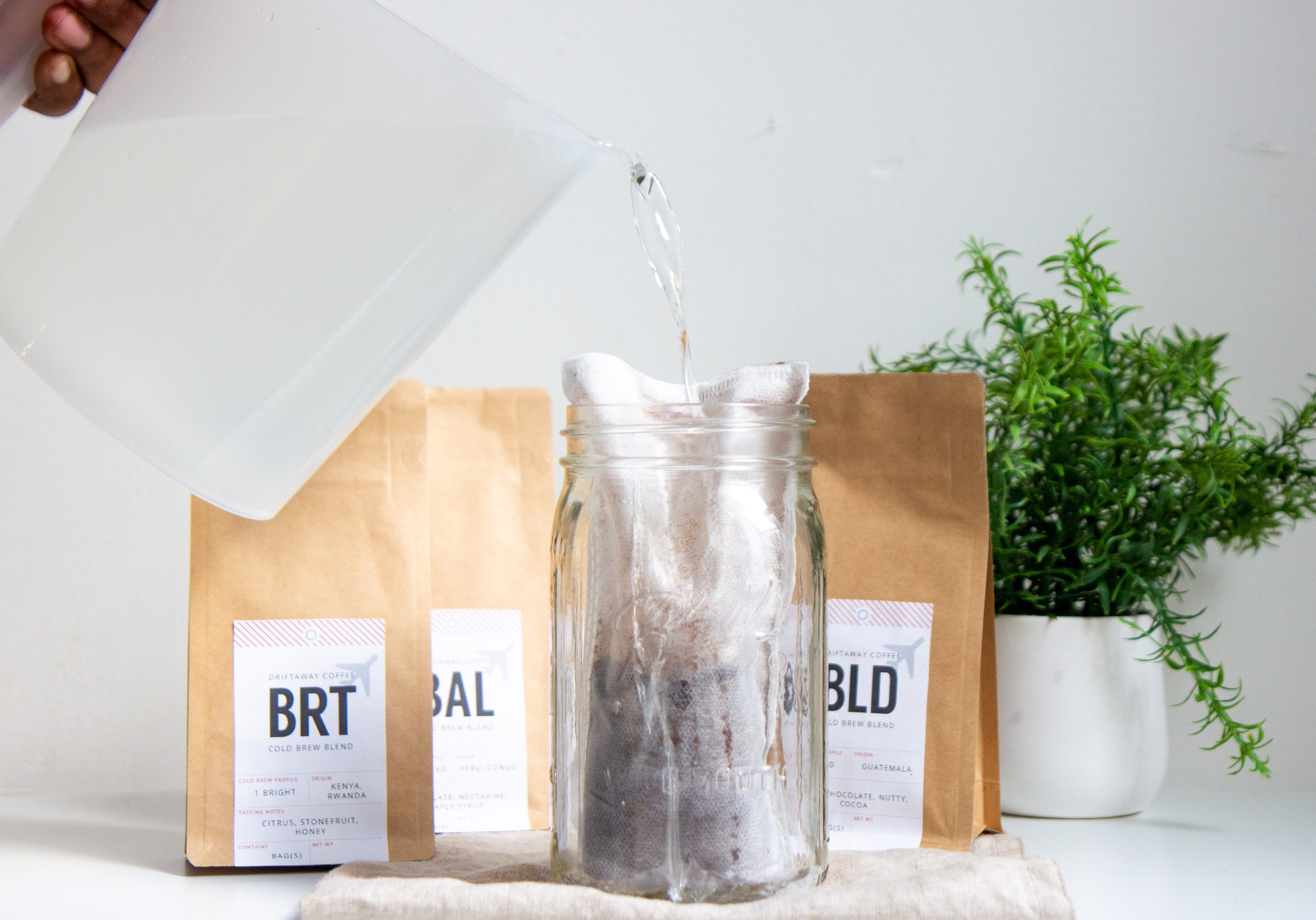 Pouring water into Driftaway cold brew bags